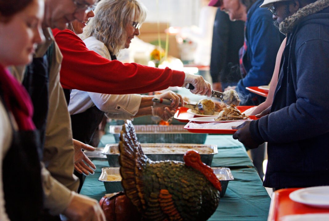 Volunteers help serve Thanksgiving meals