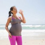pregnant-woman-water-bottle-feature-548×336